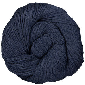 Navy blue skein of yarn on a white background