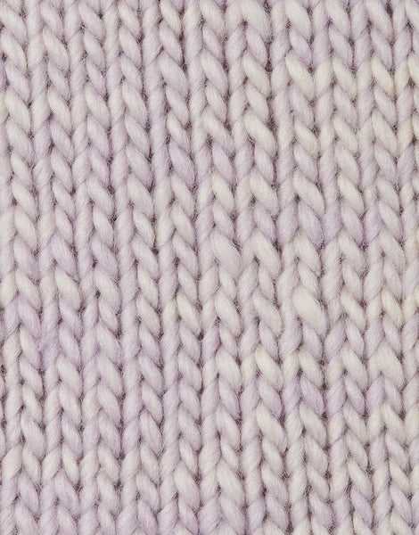 A close-up of a knitted fabric texture in a soft lavender