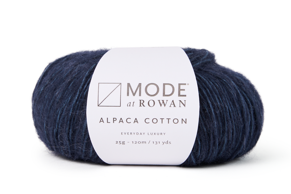 Navy skein of yarn with a Rowan label on a white background