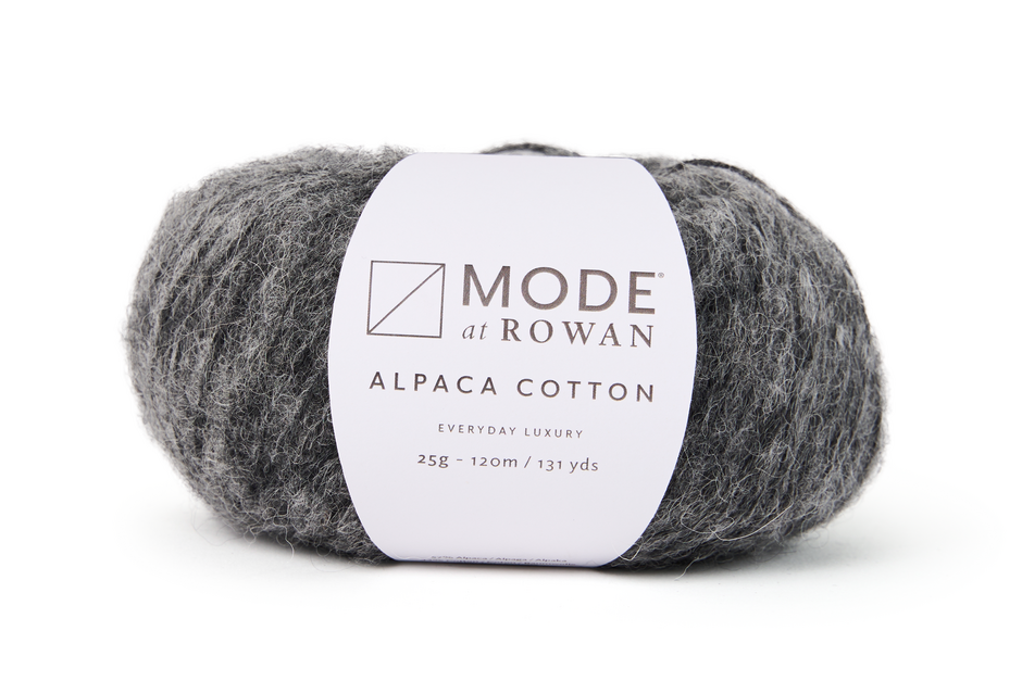 Gray skein of yarn with a Mode at Rowan label on a white background
