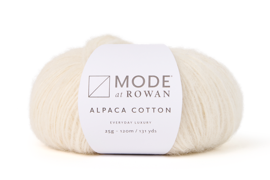 white Ball of Mode at Rowan Alpaca Cotton yarn on a white background