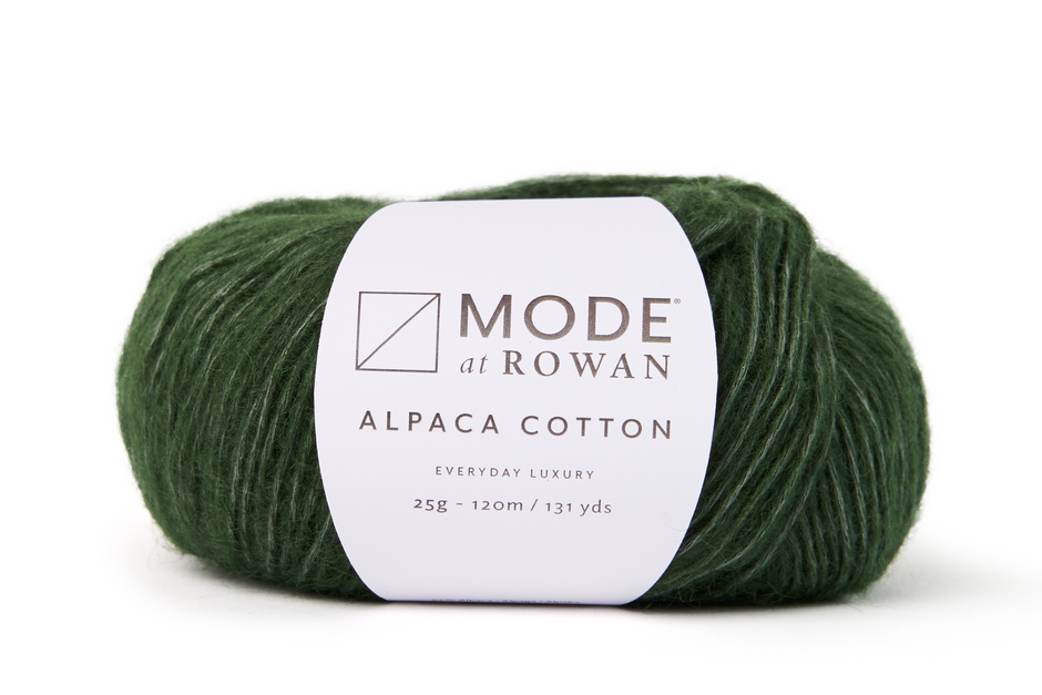 Green skein of yarn with a Mode at Rowan label on a white background