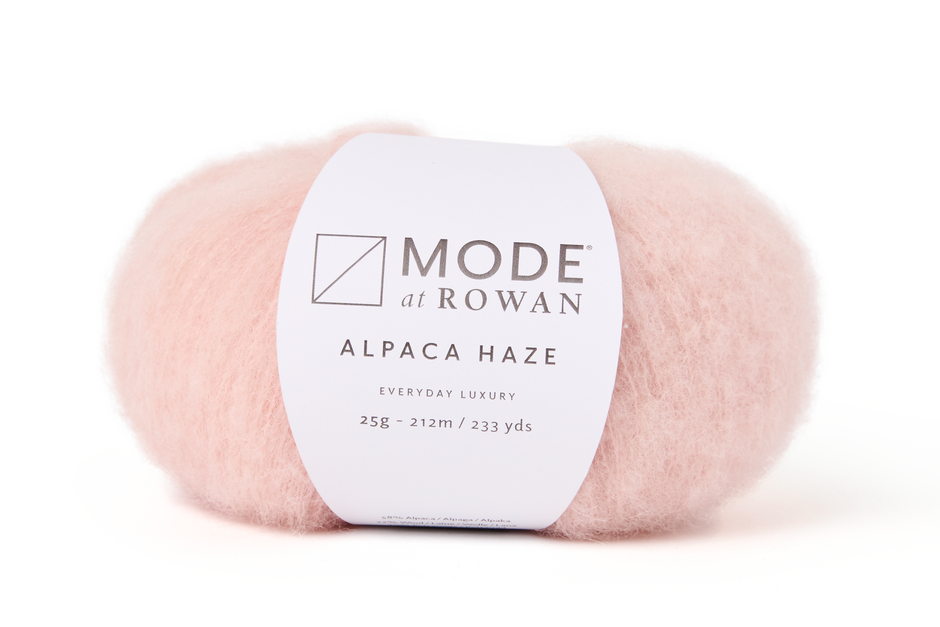 Ball of pale pink yarn with a 'Mode at Rowan' label on a white background