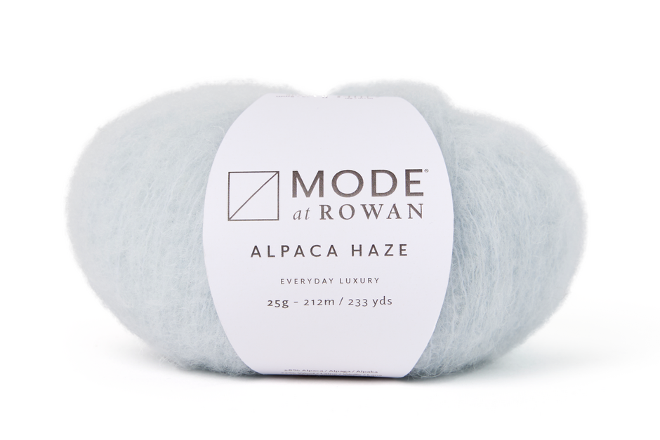pale blue skein of yarn with a Mode at Rowan label on a white background