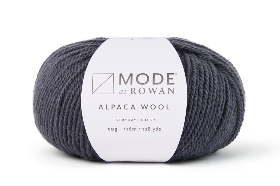 a grey Ball of Mode by Rowan alpaca wool yarn on a white background
