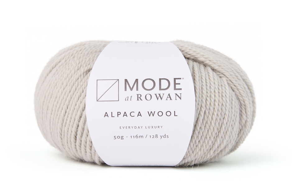 a pale grey Ball of Mode at Rowan alpaca wool yarn on a white background
