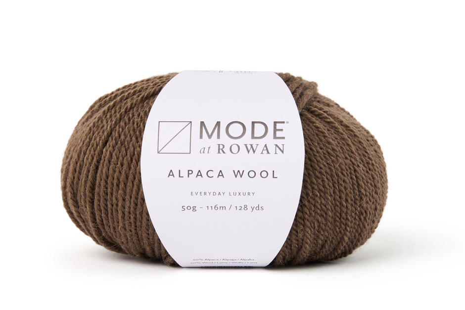 dark Brown skein of alpaca wool with a Mode at Rowan label on a white background