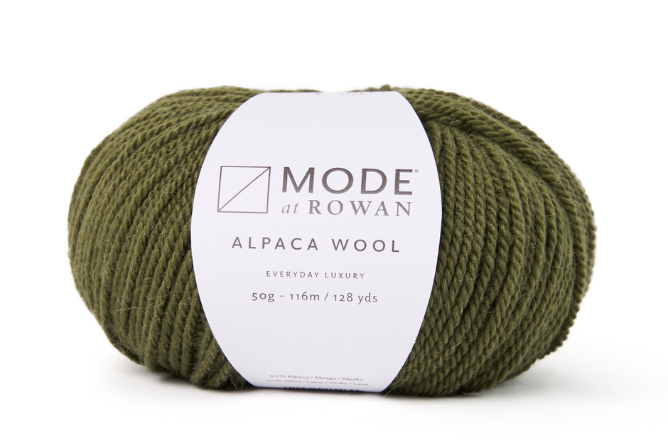 Ball of olive green yarn with a Rowan label on a white background
