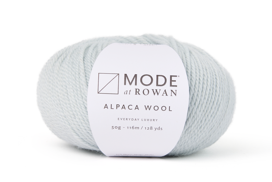 Light blue skein of yarn with a 'Mode at Rowan' label on a white background