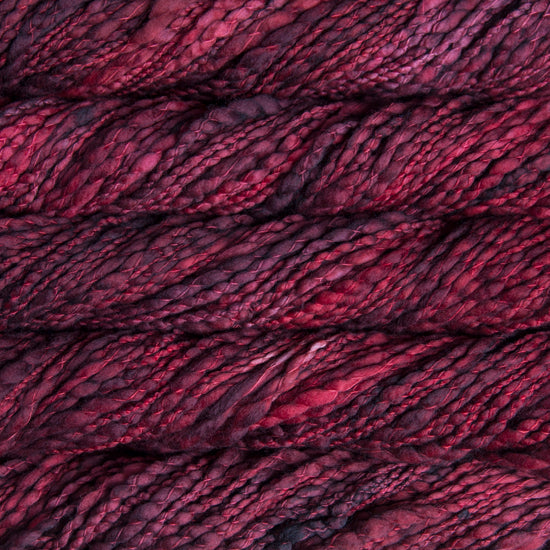 Close-up of variegated yarn of deep red.