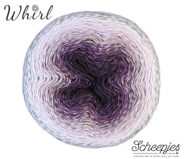 A ball of Scheepjes Whirl yarn showing a purple and lavender gradient pattern on a white background with brand text.