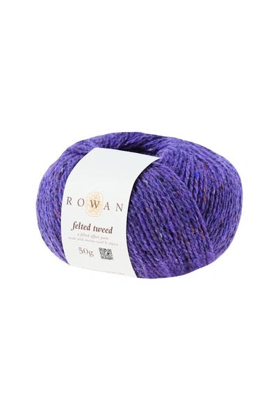 A skein of Rowan Felted Tweed yarn in a heathered purple color, wrapped with a white paper label, on a plain white background.