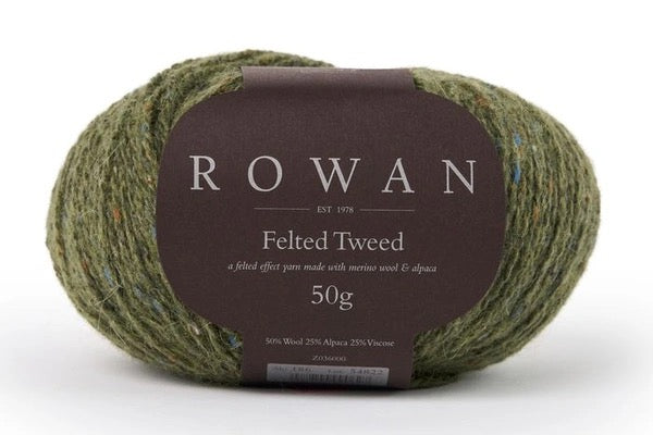 Olive Green skein of felted tweed  yarn with a Rowan label on a white background
