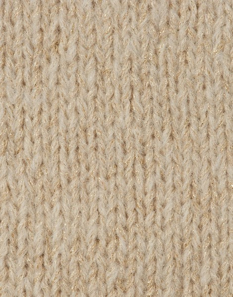 Close-up of a beige textured knit fabric with a slight metallic sheen