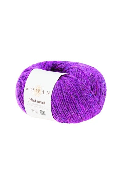 A skein of bright  purple felted tweed yarn with a white paper label reading 'ROWAN' and 'felted tweed' on a plain white background.