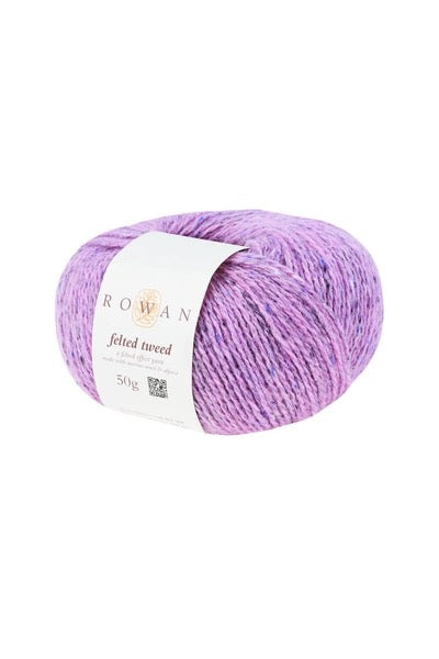 A single skein of Rowan felted Tweed yarn in a variegated light purple and pink colorway, with a white paper label wrapped around it, set against a plain white background.