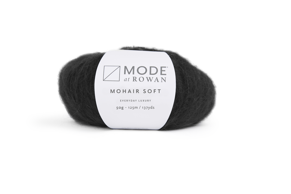 black skein of yarn with a Mode de Rowan label on a white background