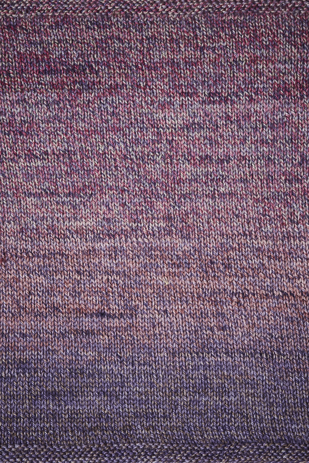 Close up of a swatch showing the red, purple, and blue gradient.