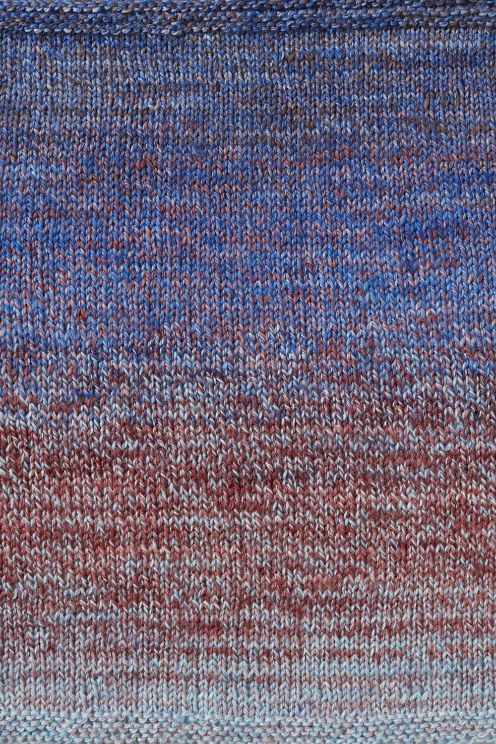 Close up of a swatch showing the blue and red gradient.