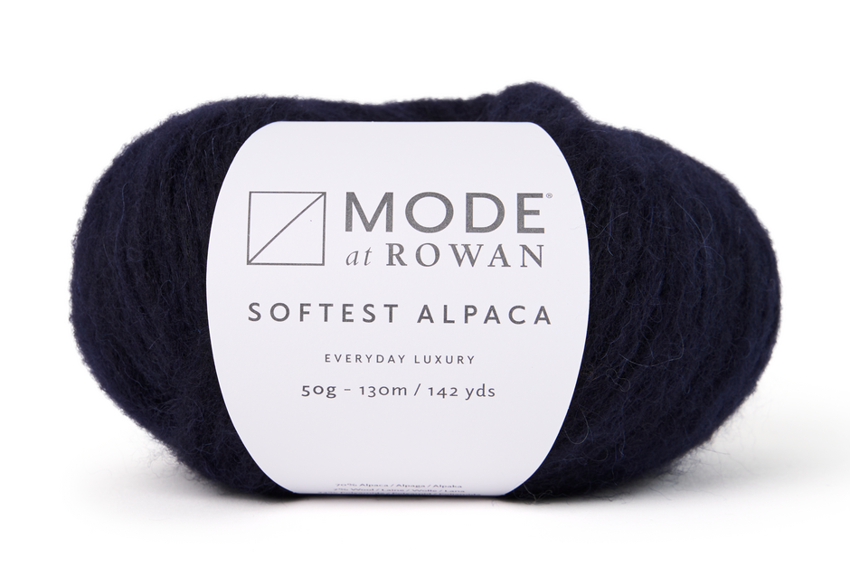 Navy yarn ball with a Mode at Rowan label on a white background