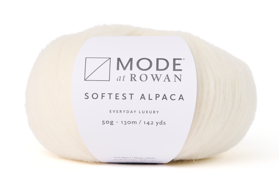 white Ball of Mode at Rowan softest alpaca yarn on a white background