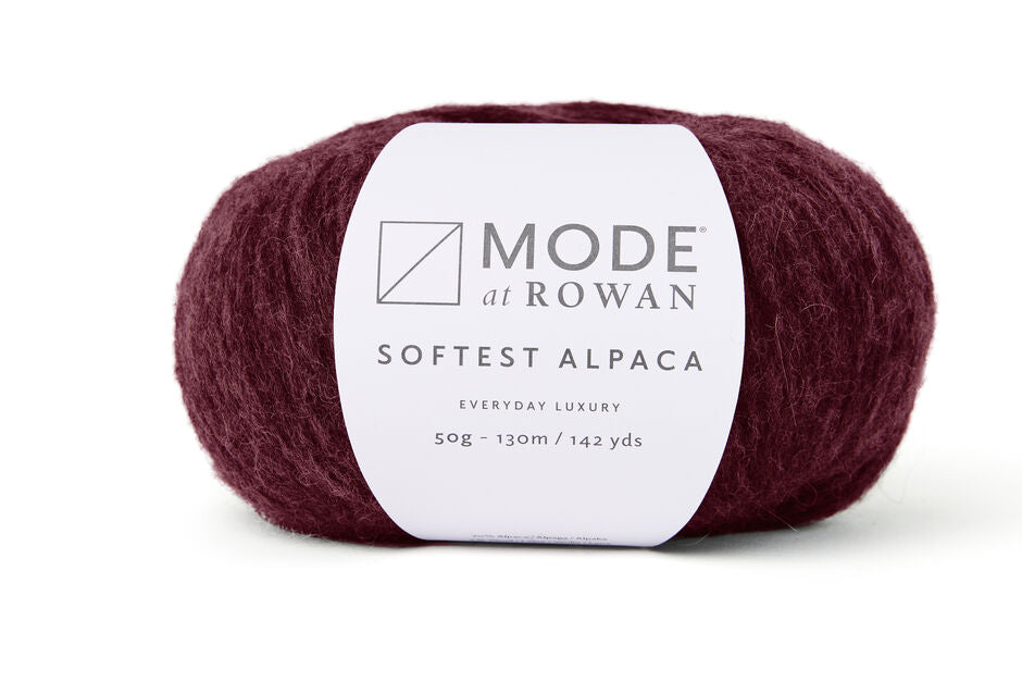 brick read Ball ofMode at Rowan softest alpaca yarn on a white background