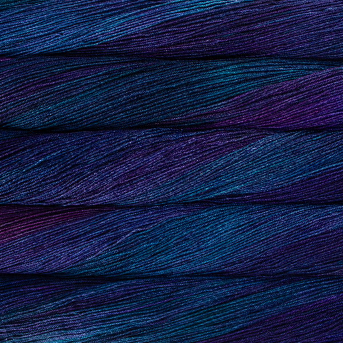Close-up of multicolored yarn with shades of blue and purple