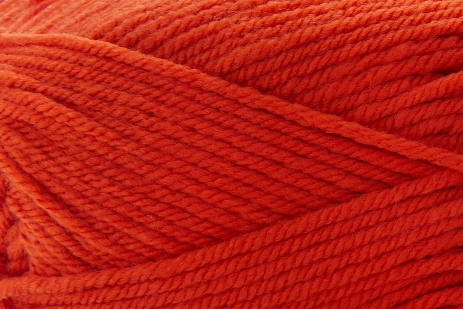 Close-up of bright orange yarn