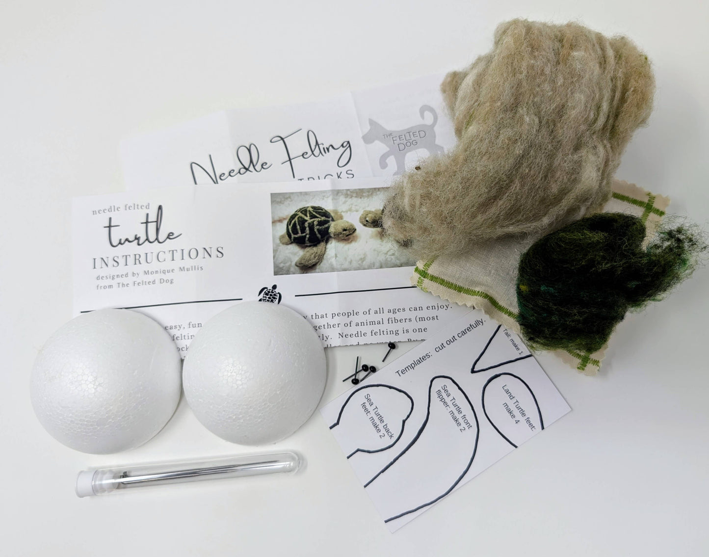 Necelle Felting kit with felted turtle, wool, and instructions on a white background