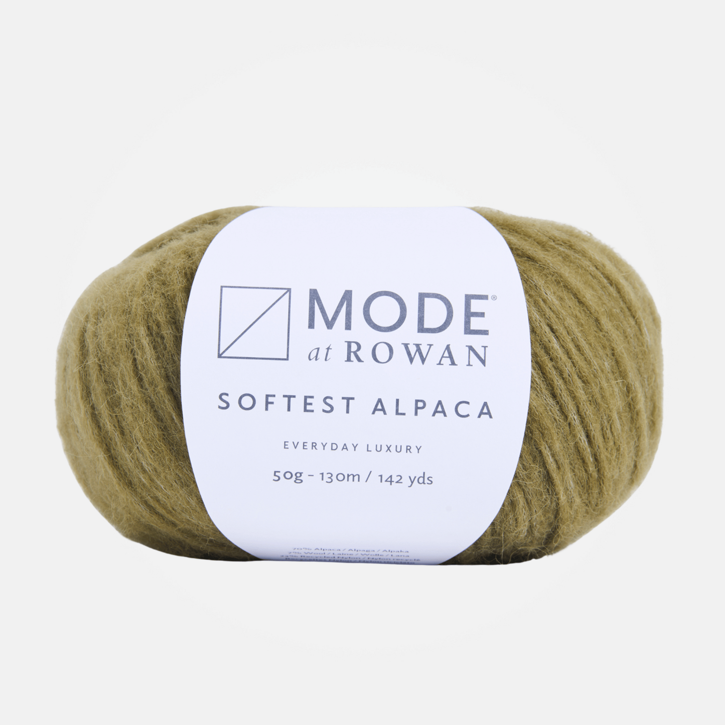 A pale olive green single ball of Mode at Rowan Softest Alpaca yarn in a muted olive-khaki shade, wrapped with a white paper label showing the brand name and product details, on a light gray background.