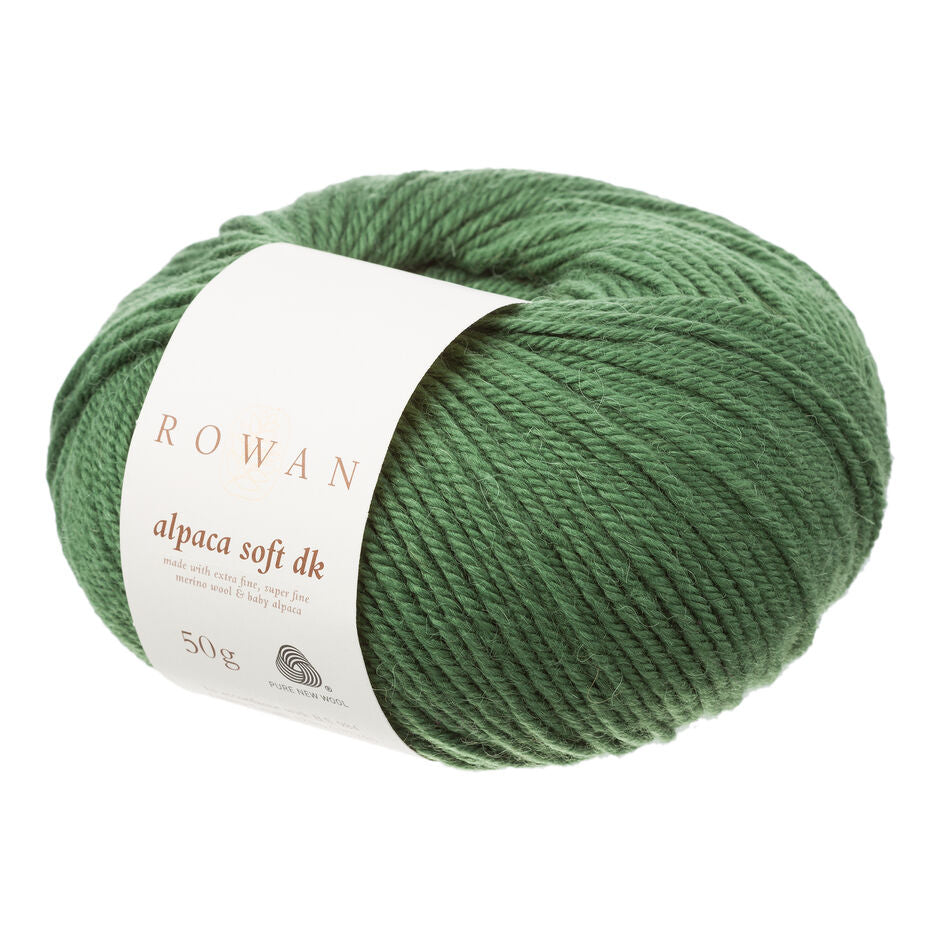 Green skein of yarn with a Rowan label on a white background